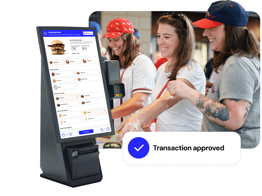 Guests ordering at a self-service kiosk at a stadium