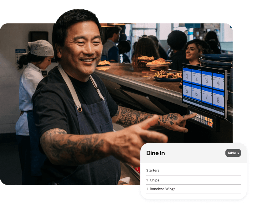 A chef using a Genius kitchen display