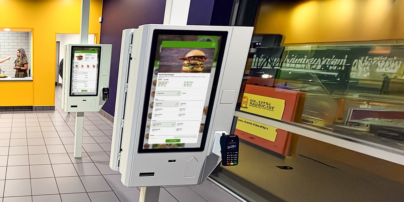 A quick service restaurant ordering area with self-ordering kiosks