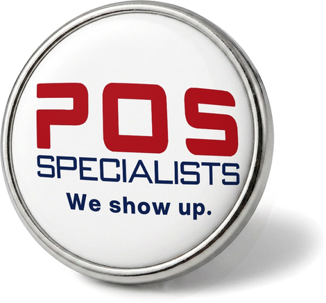 A POS Specialists enamel pin badge reading We show up.