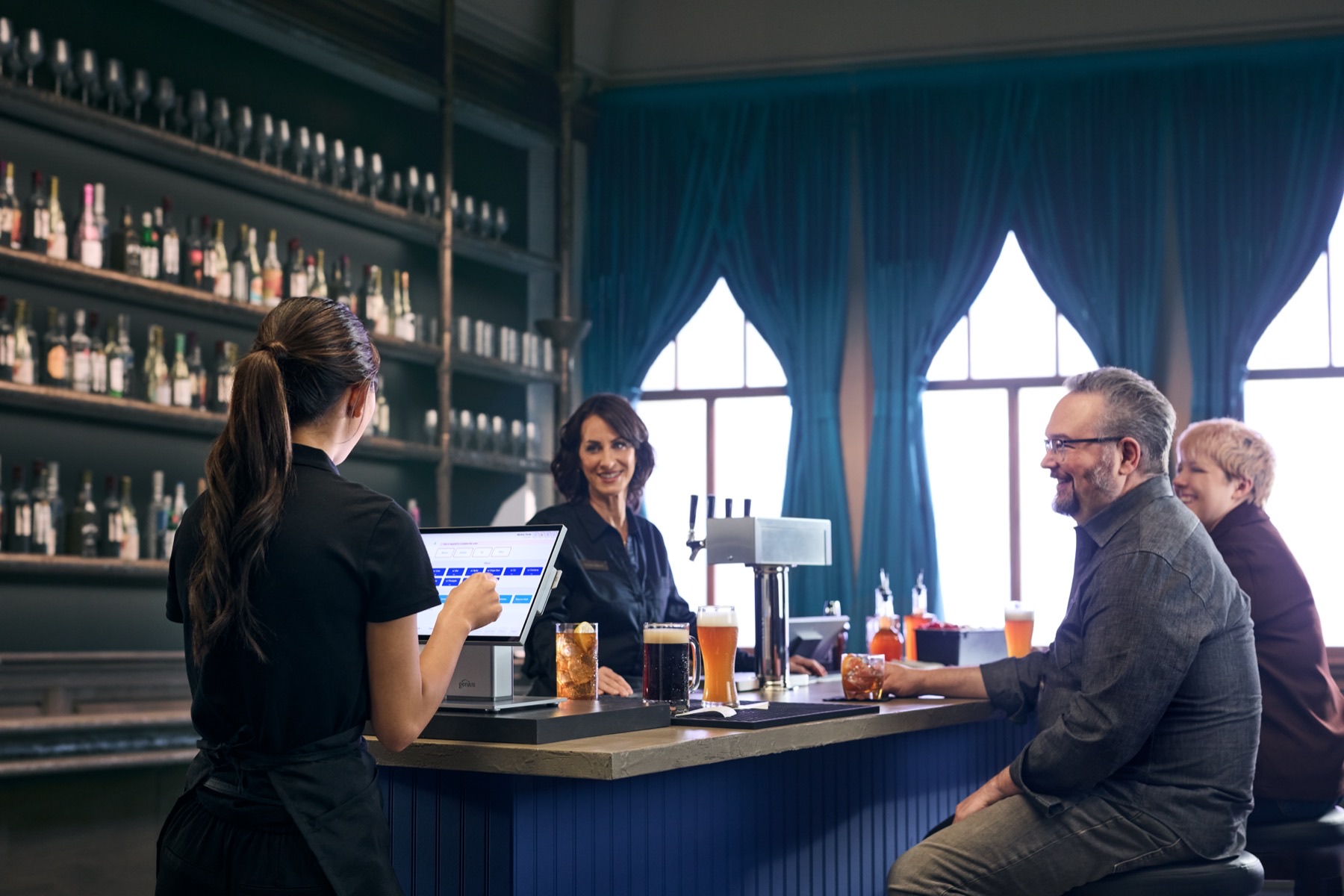 Bartender taking an order at the bar counter